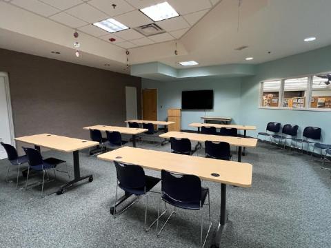 Community Room with tables and chairs