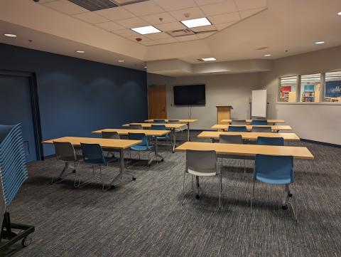 Community Room with tables and chairs